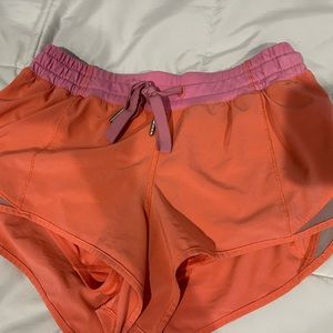 pink/salmon color lulu shorts